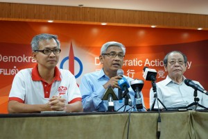 Aziz (centre) said he has come to realise DAP's efficiency and meritocracy, at a press conference with DAP leaders Lim Kit Siang (right) and Tony Pua (left)