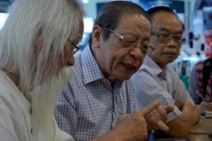 (L-R) Pak Samad, Lim and Fong at the press conference earlier.